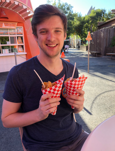 Frank eating in front of Cozy Cones